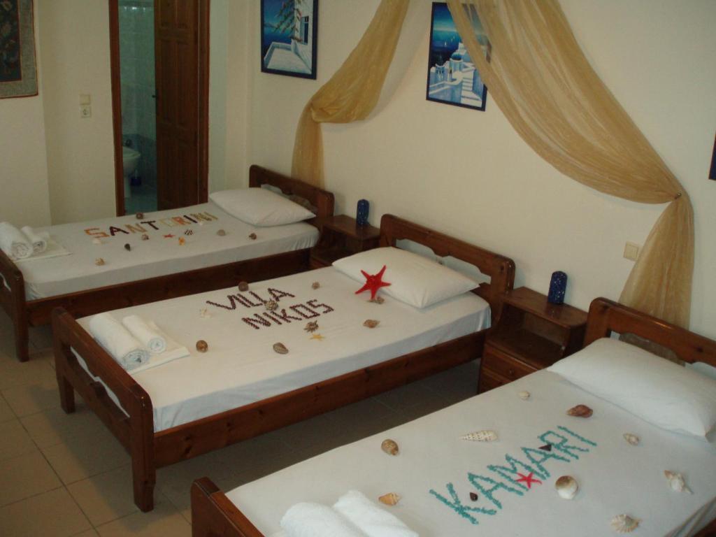 Villa Nikos Karamolegkos Kamari Номер фото